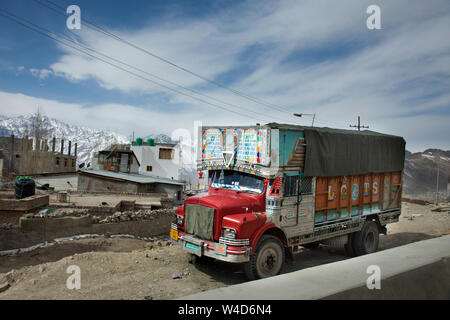 Traffic road with Indian and tibetan people drive car and colorful truck on Srinagar Leh Ladakh highway at Leh Ladakh on March 21, 2019 in Jammu and K Stock Photo