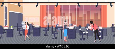 businesswoman posting stickers using sticky notes startup planning management teamwork concept businesspeople working together in creative office full Stock Vector