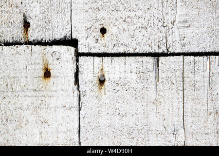 White wooden rustic planks attached with rusty nails Stock Photo