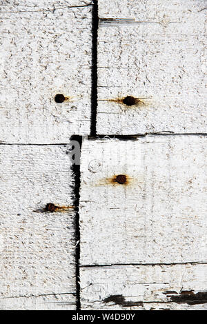White wooden rustic planks attached with rusty nails Stock Photo
