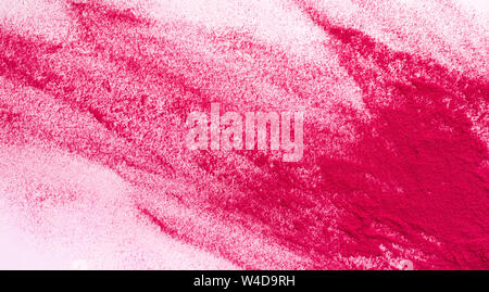Abstract explosion of pink holi color on white background Stock Photo