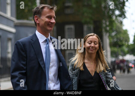 London, UK. 22nd July, 2019. British Foreign Secretary Jeremy Hunt (L) leaves Downing Street after a government's emergency committee Cobra meeting in London, Britain, on July 22, 2019. Prime Minister Theresa May has been chairing the government's emergency committee Cobra (Cabinet Office Briefing Room A) to receive updates and discuss security in the area. British Foreign Secretary Jeremy Hunt warned late Friday that serious consequences would ensue if Iran's seizure of a British-operated oil tanker is not resolved quickly. Credit: Xinhua/Alamy Live News Stock Photo