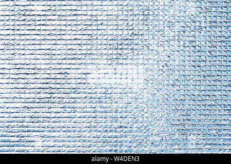 Silvery polyethylene texture Grey shiny background. Stock Photo