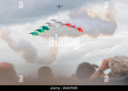 The Italian Air Force provided the highlight for many in the close formations, solo exhibitions and smoke-flag streaming of the ten Aermacchi AT-339A at RAF Fairford, Gloucestershire, UK. 21st July 2019. Stock Photo