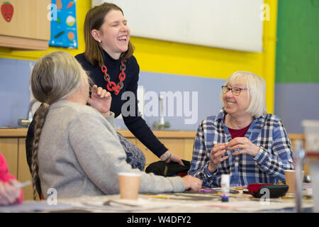 Glasgow, UK. 1 February 2019. Jo Swinson MP attends Ageless Art Mature Makers Class.  Working on a project called 'Winter Wonderland' which is brightening up the Milngavie Main Street, decorating Costa Coffee's front window with a project called 'Storm In a tea Cup' which will showcase the groups collective artistic efforts together in one large artwork.  Agless Art was formed by East Dunbartonshire women Lynsey Hunter and Geraldine Scott with the aim of offering art classes to older people looking to express their artistic side through the use of different mediums and to bring people together Stock Photo