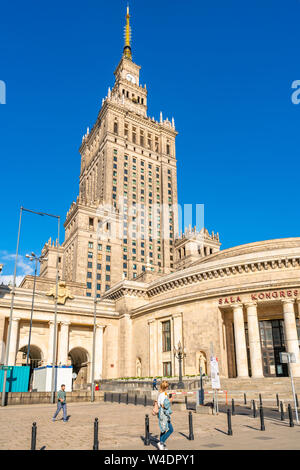 WARSAW, POLAND - JULY 18, 2019: Palace of Culture and Science in capital of Poland was constructed in 1955 and since 2007 it has been enlisted in the Stock Photo