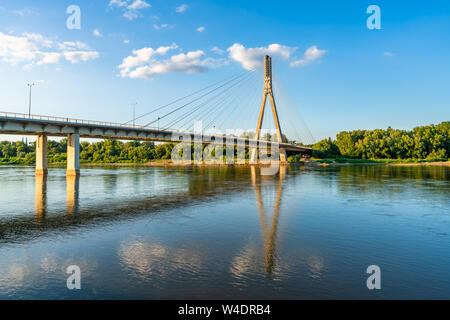 WARSAW, POLAND - JULY 18, 2019: Opened on 06/10/2000, a 479 meters long Swietokrzyski cable-stayed bridge over the Vistula river in Warsaw links Powis Stock Photo