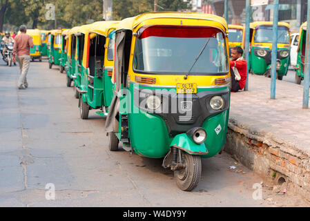 NEW DELHI - FEB 24: Traditional auto rickshaw cars in New Delhi on February 24. 2018 in India Stock Photo