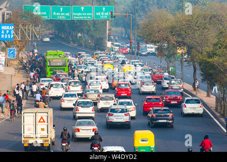 NEW DELHI - FEB 23: Car traffic in New Delhi, city covered in the smog on February 23. 2018 in India Stock Photo