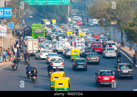 NEW DELHI - FEB 23: Car traffic in New Delhi, city covered in the smog on February 23. 2018 in India Stock Photo