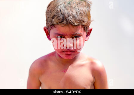 NEW DELHI - MAR 02: Indian street poor boy in New Delhi on March 02. 2018 in India Stock Photo