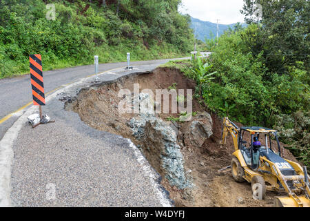 Road damage and reconstruction after an earthquake in Oaxaca state in rural Mexico Stock Photo