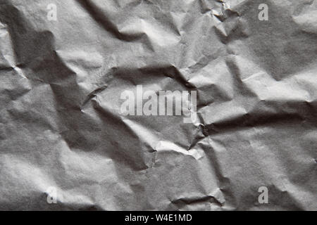 Light gray crumpled paper texture. Abstract background under the text. Stock Photo