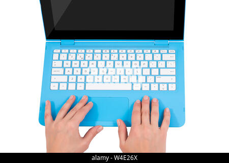 Female hands over white keyboard of blue laptop Stock Photo