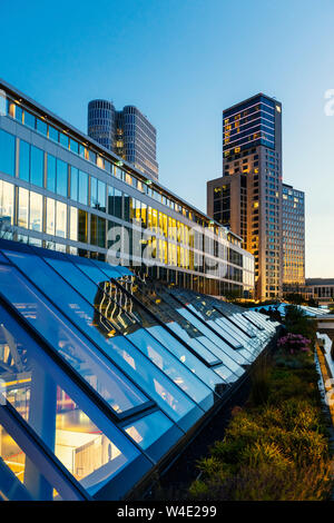 Shopping mall Bikini Berlin and Skyscrapers in sunset. Stock Photo