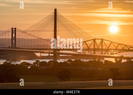 Queensferry Crossing at sunrise with the three Forth Bridges at South Queensferry