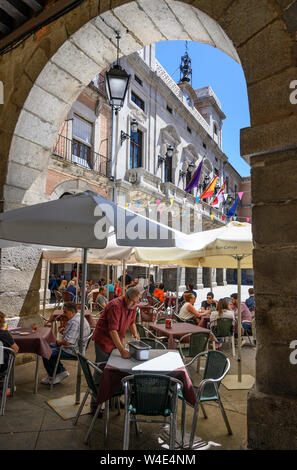 Cafe tables in The Plaza Mercado Chico with the Ayuntamiento, town hall, in the background, Avila, Spain Stock Photo