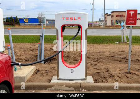 Newly Installed Tesla Supercharger Stall in Mississauga, Ontario. Stock Photo