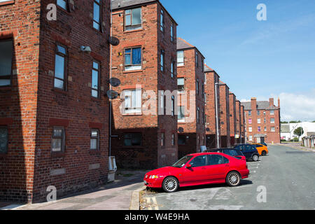 Victorian brick tenement blocks on Barrow Island Barrow in Furness