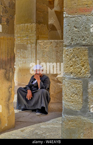 Guard resting at the mortuary Temple of Queen Hatshepsut, Luxor  Egypt Stock Photo