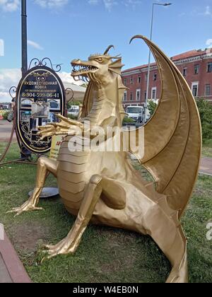 Nizhny Novgorod, Russia July 10, 2019: Moto - Family Festival 2019.  Caption: Golden Dragon good luck, defending against detractors. I bring money. Ru Stock Photo