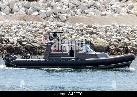 RCMP (Royal Canadian Mounted Police) patrol boat in Victoria, BC, downtown harbour. Stock Photo