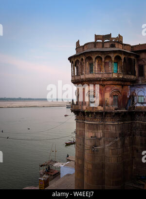 Varanasi, INDIA - CIRCA NOVEMBER 2018: Old building in the ghats of Ganges River in Varanasi. Varanasi is the spiritual capital of India, the holiest Stock Photo
