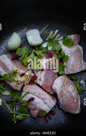 Raw pork with spice in the pot Stock Photo