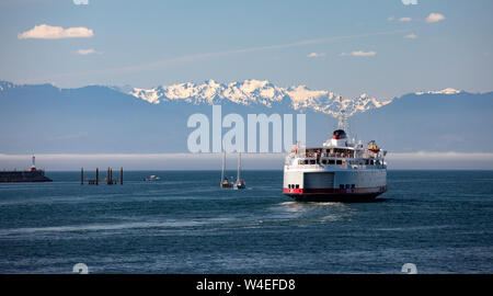MV Coho Ferry leaving Victoria's Inner Harbour to Port Angeles, Washington - Victoria, Vancouver Island, British Columbia, Canada Stock Photo