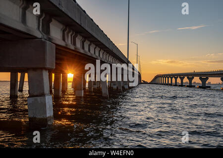 Sunrise under the bridge with a view of the Tampa Bay in Florida Stock Photo