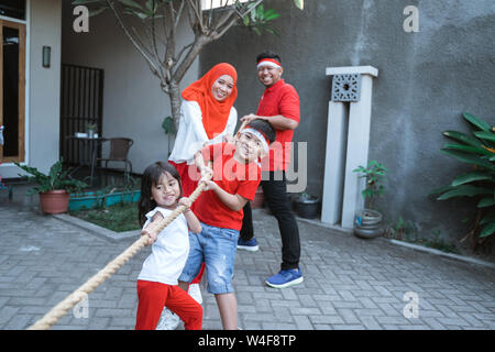 lomba tarik tambang. indonesia tug of war Stock Photo