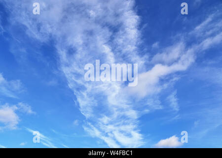Beautiful and calming cirrus cloud formations on a deep blue summer sky Stock Photo