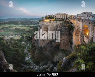 Aerial view of Tajo Gorge and Ronda Puente Nuevo Bridge at sunrise - Ronda, Malaga Province, Andalusia, Spain Stock Photo