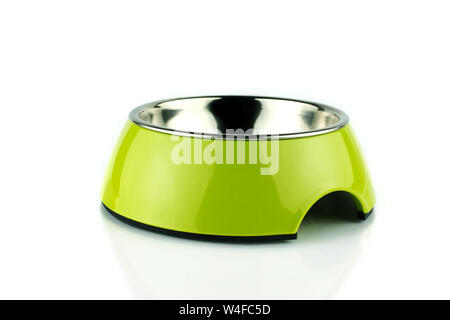 Empty green pet bowl methacrylate food container for  dog or cat. Isolated on white background. Stock Photo