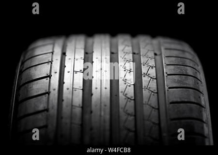 Sport summer tire isolated on black background Stock Photo