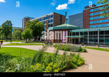 The Roscoe and Schuster buildings from Brunswick Park, University of Manchester, England, UK Stock Photo