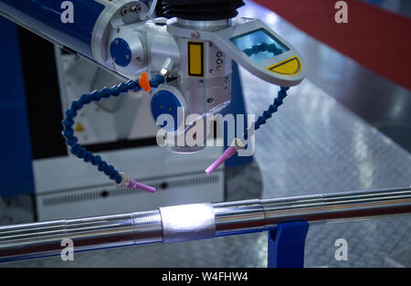 Semi-automatic mobile laser welding machine operated through a remote control Stock Photo
