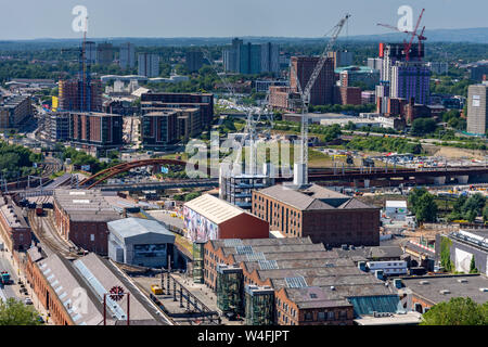 Looking over the Museum of Science and Industry to the Middlewood Locks area in Salford, from the Cloud 23 bar in the Beetham Tower, Manchester, UK. Stock Photo