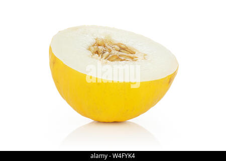 One half of fresh yellow melon canary isolated on white background Stock Photo