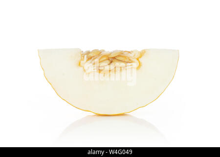 One slice of fresh yellow melon canary with seeds isolated on white background Stock Photo