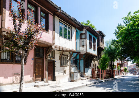 Afyonkarahisar ,TURKEY-May 14,2018: Beautiful old street in downtown with houses with wooden shutters in the classic Turkish Ottoman style, The two-st Stock Photo