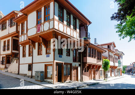 Afyonkarahisar ,TURKEY-May 14,2018: Beautiful old street in downtown with houses with wooden shutters in the classic Turkish Ottoman style, The two-st Stock Photo