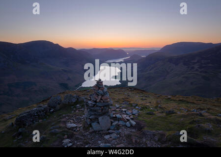 Sunset from the summit of Fleetwith Pike overlooking Buttermere Stock Photo