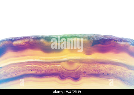 Abstract background, brown and orange striped agate slice mineral cross section pastel toned on white background Stock Photo