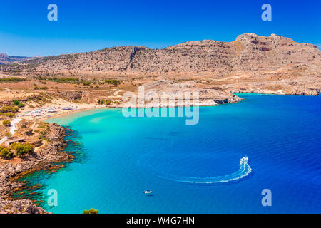 Sea skyview landscape photo of Agia Agathi beach near Feraklos castle on Rhodes island, Dodecanese, Greece. Panorama with sand beach and clear blue wa Stock Photo