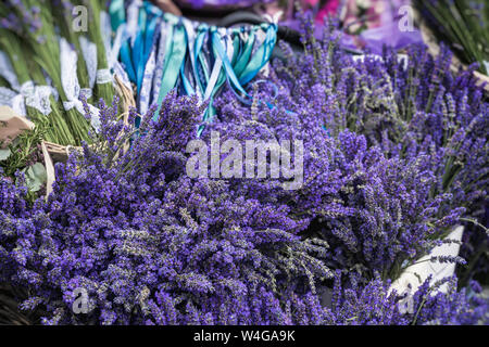 Lavender bunches in provincial flower market, herbal background, texture Stock Photo