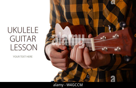 A man playing ukulele in close up view. Template design with sample text Stock Photo