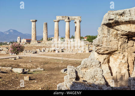 Archaeological site with archaic Temple of Apollo, Dorian columns, Corinth, Greece Stock Photo