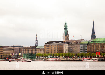 City view with city hall and St Nikolai Memorial and Inner Alster in the foreground, Hamburg, Germany Stock Photo