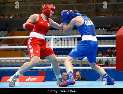 Ireland's Grainne Walsh (left) on her way to winning against Great Britain's Rosie Eccles in the Women's Welterweight Boxing at sport Palace Uruchie, during day four of the European Games 2019 in Minsk. Stock Photo